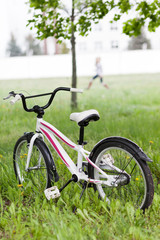 Fototapeta na wymiar Bright children's running bike close up