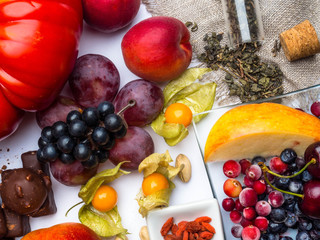 antioxidants, resveratrol food as green tea, grape, blueberry, apricot, apple, cocoa, tomatoes, pomegranate, physalis, dark chocolate, goji, nuts