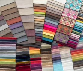 colorful background from colored upholstery fabric samples