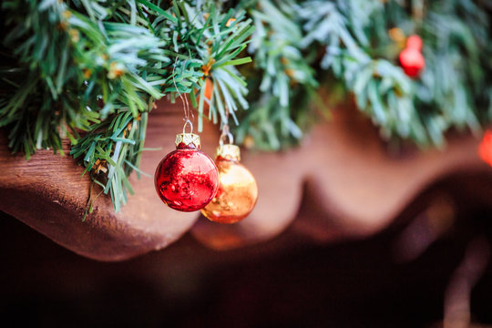 Magical Christmas market: Decoration with Christmas bauble on a fir branch.
