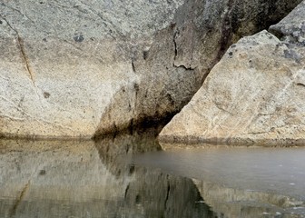 Rocks reflected in pond