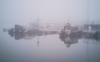 Fototapeta premium Fishing boats in fog