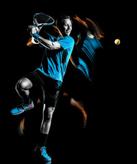 Fototapeta na wymiar one caucasian tennis player man isolated black background in light painting speed motion