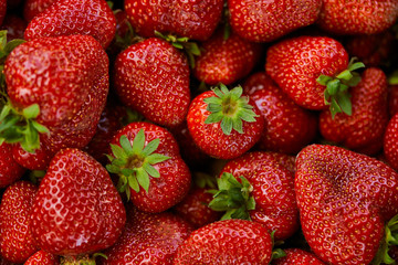 top view of background with red fresh strawberries