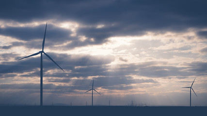 Obraz premium Wind warm on agricultural ground with cloudy sky in background