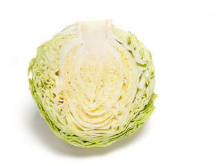 Cut green cabbage on white background