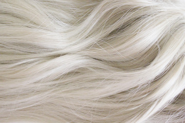 Beautiful hair. Long curly blonde hair. Color in light ash blonde.