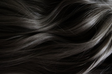 Beautiful hair. Long curly dark hair. Staining in dark color.