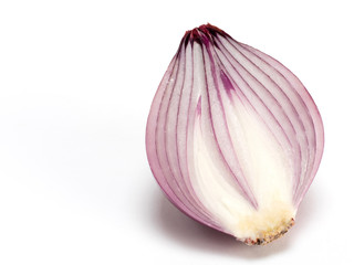 Cut in half red onion on white background