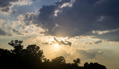 Sun shining through the clouds