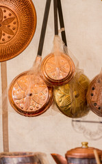 Hand-designed copper utensils for working in the kitchen, dishes, pots, pans and cauldrons