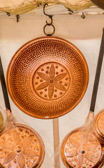Hand-designed copper utensils for working in the kitchen, dishes, pots, pans and cauldrons