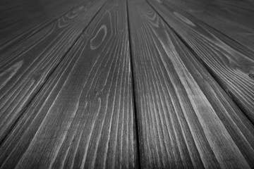 Old wooden plank background with selective focus. 