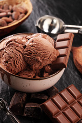 Chocolate coffee ice cream ball in a bowl. ice cream scoop