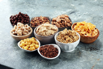 Cereal. Bowls of various cereals for breakfast. Muesli with kids cereals.