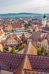Sibiu, Romania elevated cityscape with the Council Tower seen from the steeple of the Lutheran Cathedral of Saint Mary