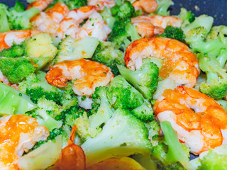 Closeup of thai, chinese traditional healthy food stir-fried broccoli with shrimps or prawns.