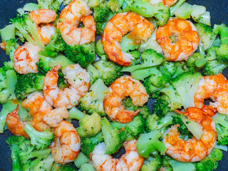Closeup of thai, chinese traditional healthy food stir-fried broccoli with shrimps or prawns.
