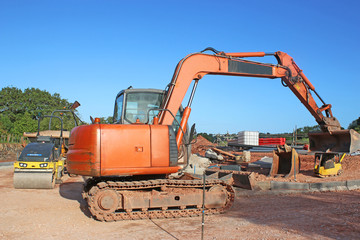 Digger working on a road construction site