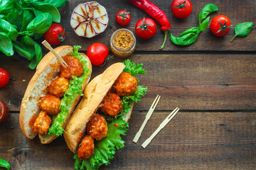 meatballs sandwich (snack with meat and vegetables). food background. top view. copy space