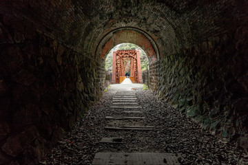 Gloomy abandonned railway tunnel