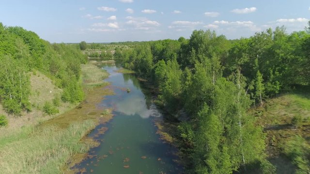 Aerial view of river canyon in old phosphorite and limestone mining site