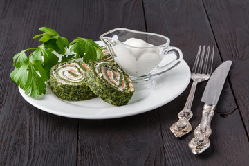 Roll salted salmon, cream cheese and spinach