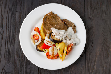 Barbecue dish. Beef steak and grilled vegetables