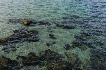Vacation, the calm sea, blue water texture with turquoise tones of the mediterranean sea on the island of Mallorca, Spain