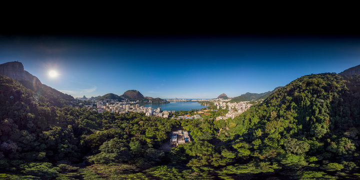 Rio de Janeiro seen from the slopes of the Corcovado mountain looking out over the popular touristic South neighbourhoods. 360 degree aerial panorama ready for use in 3D environment mapping and 360VR.