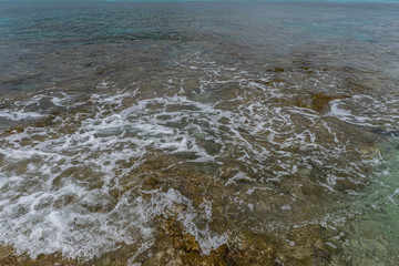 the calm sea, blue water texture with turquoise tones of the mediterranean sea on the island of Mallorca, Spain