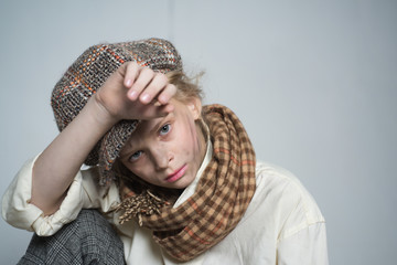 Orphanage. teen girl in retro male suit. retro fashion model. Vintage. old fashioned child in beret. street kid with dirty face. vintage english style. Homelss. childrens shelter. childrens day