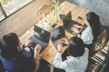group of business woman conference in cafe
