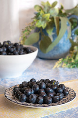 Fresh picked blueberries in a light and bright kitchen environment.