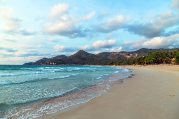 Tropical bungalows on rock beach