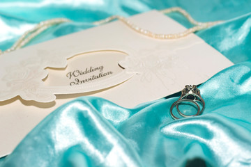 Wedding rings on the invitation card, preparations for the wedding, wedding decorations