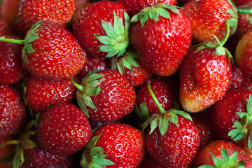 Background from freshly harvested strawberries. Top view