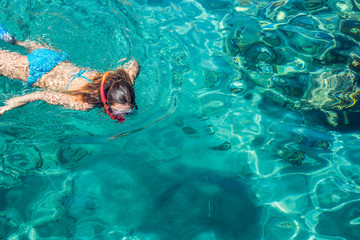 sexy girl swimming and snorkeling in Red sea beautiful aquamarine water exotic natural environment,...