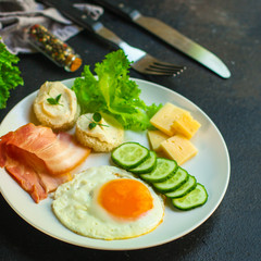 breakfast, healthy food (scrambled eggs, bacon, lettuce, asparagus, cucumbers, cheese). food background. copy space