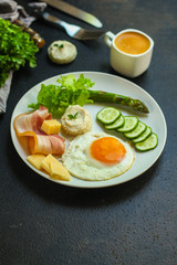 breakfast, healthy food (scrambled eggs, bacon, lettuce, asparagus, cucumbers, cheese). food background. copy space