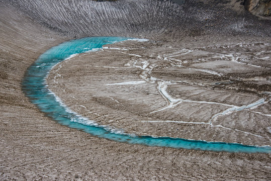 Russia, Kamchatka, blue glacial water in a glacier on Mutnovsky volcano
