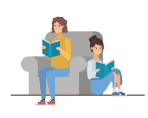 couple sitting on chair with book in hands