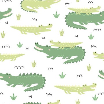 Seamless pattern with cute crocodiles