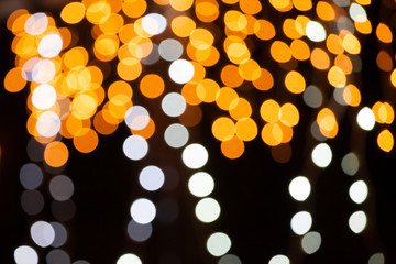 Dark background with blurred fairy lights