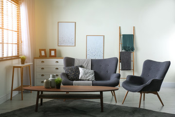 Contemporary living room interior with cozy sofa