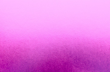 Shiny metallic pink leaf foil texture background