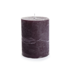 Dark aromatic decorative candle isolated on white