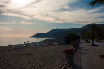  Beautiful view of the beach in Alanya, Turkey, during sunset.