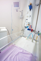 Close-up of ICU crib room, medical equipment