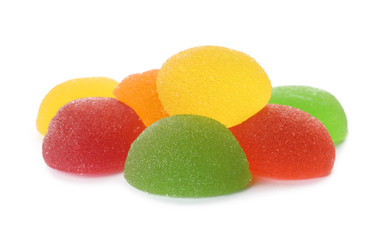 Pile of assorted jelly candies on white background